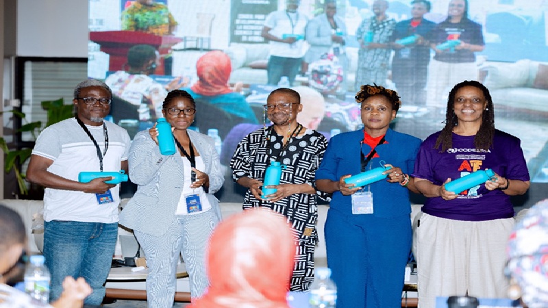 AFRIAK Coordinators and Mentors receiving presents from CODESRIA 